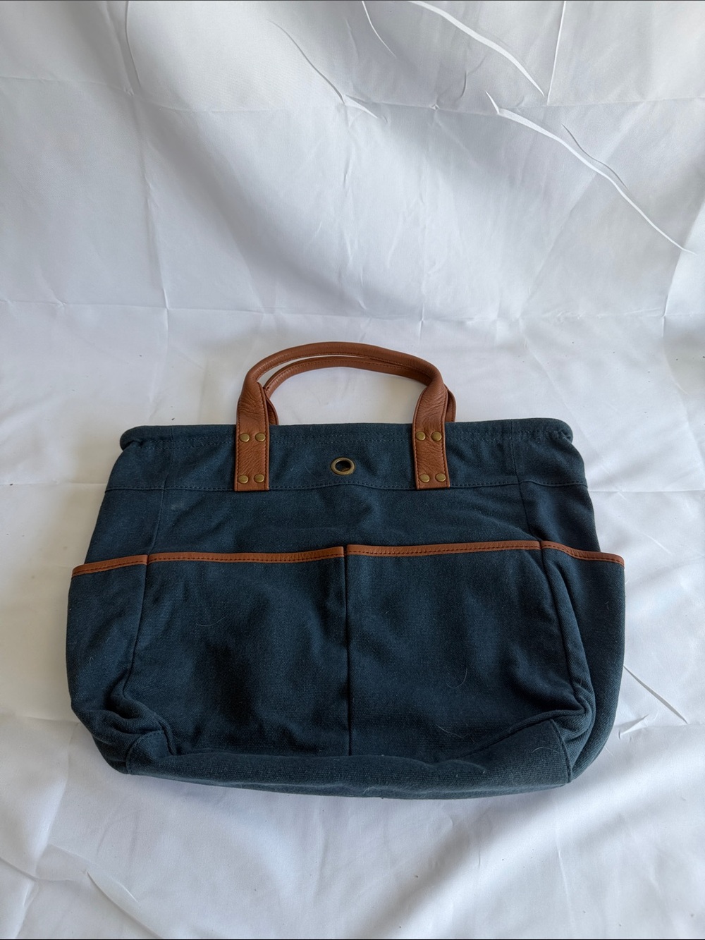 Levenger navy and brown canvas tote with leather trim